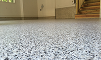 Chips hlep provide texture and will protect the concrete in case you drop something.