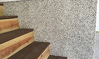 Complete the look by doing the vertical stem wall around the garage.