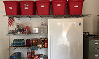A perfect drop zone and pantry around the fridge!
