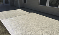 A floor coating on an outdoor patio will make cleaning it a breeze.