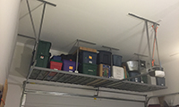 Racks don't need to necessarily go over the garage door, but what else are you going to put there?