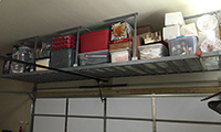 64 sq/ft of additional storage space can be found above your double car garage door.