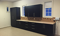 Black cabinets, black steel legs and a maple butcher blick countertop. Wow.